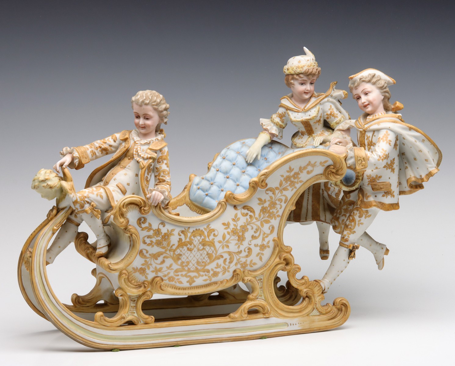 A LARGE, ELABORATE VICTORIAN BISQUE SLEIGH CENTERPIECE