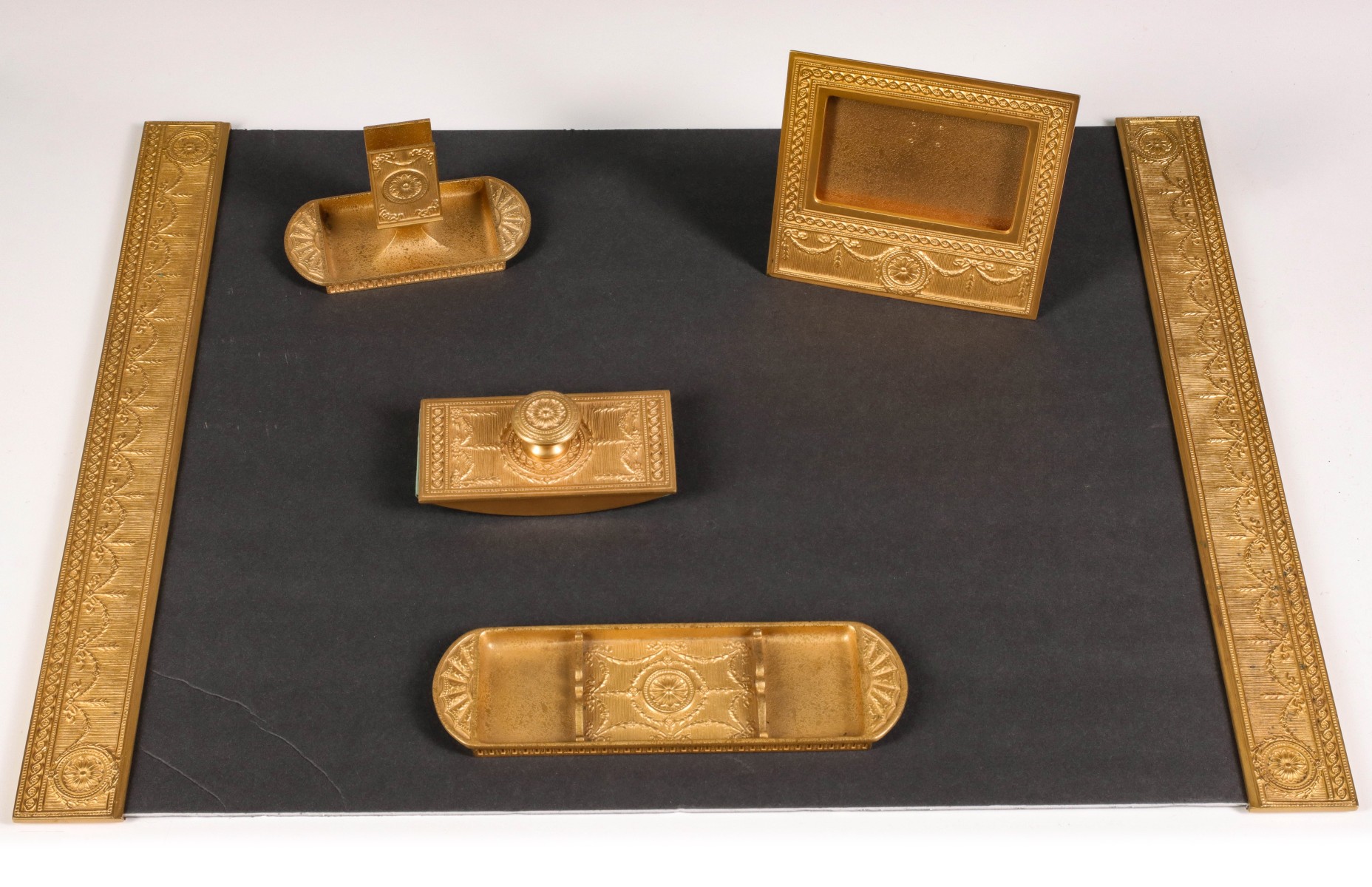 A FINE TIFFANY STUDIOS ADAM PATTERN BRONZE DESK SET