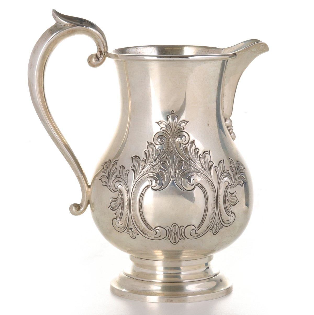 A HUNT SILVER COMPANY HAND CHASED STERLING PITCHER