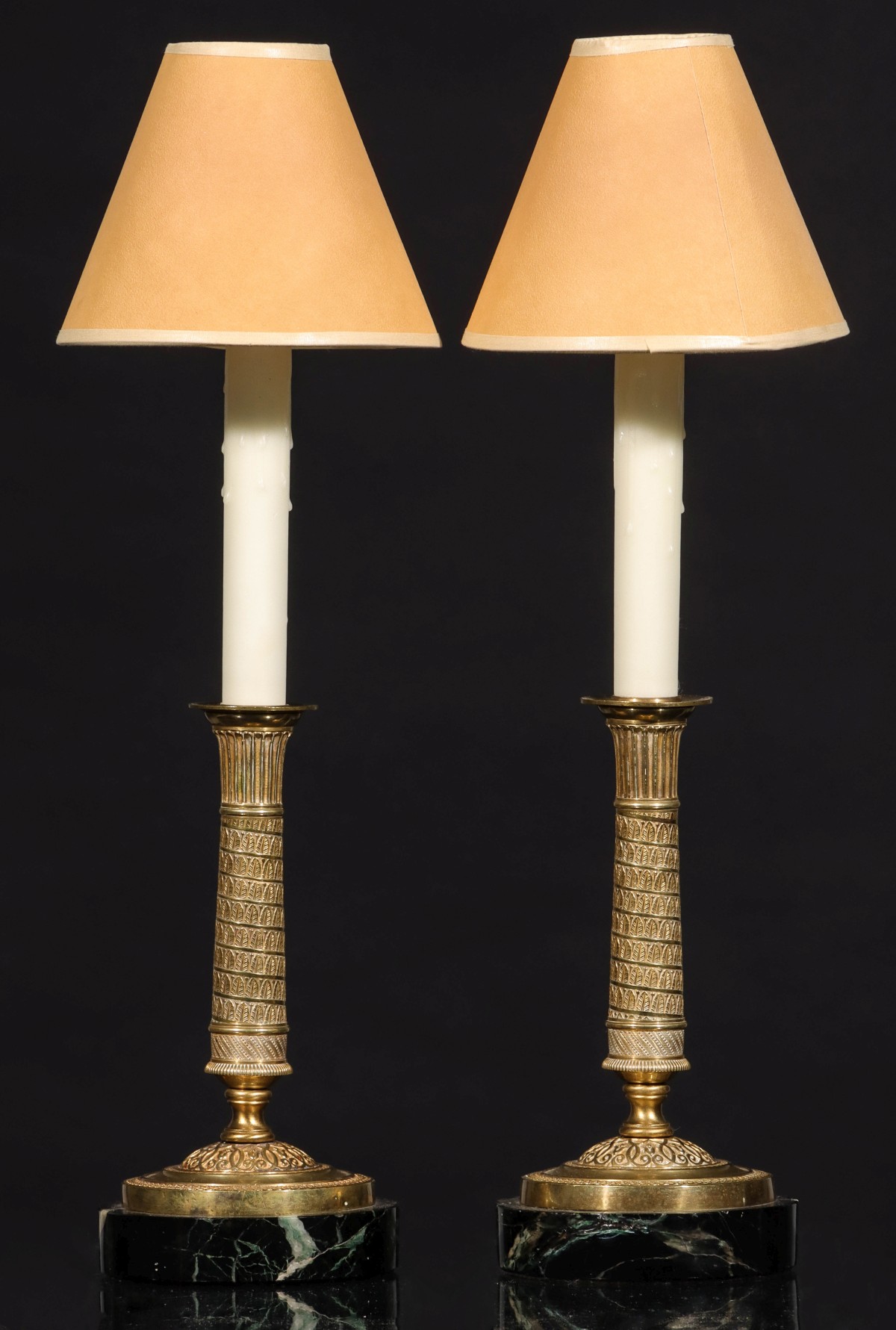 A PAIR 20TH CENTURY BRONZE CANDLESTICK LAMPS ON MARBLE