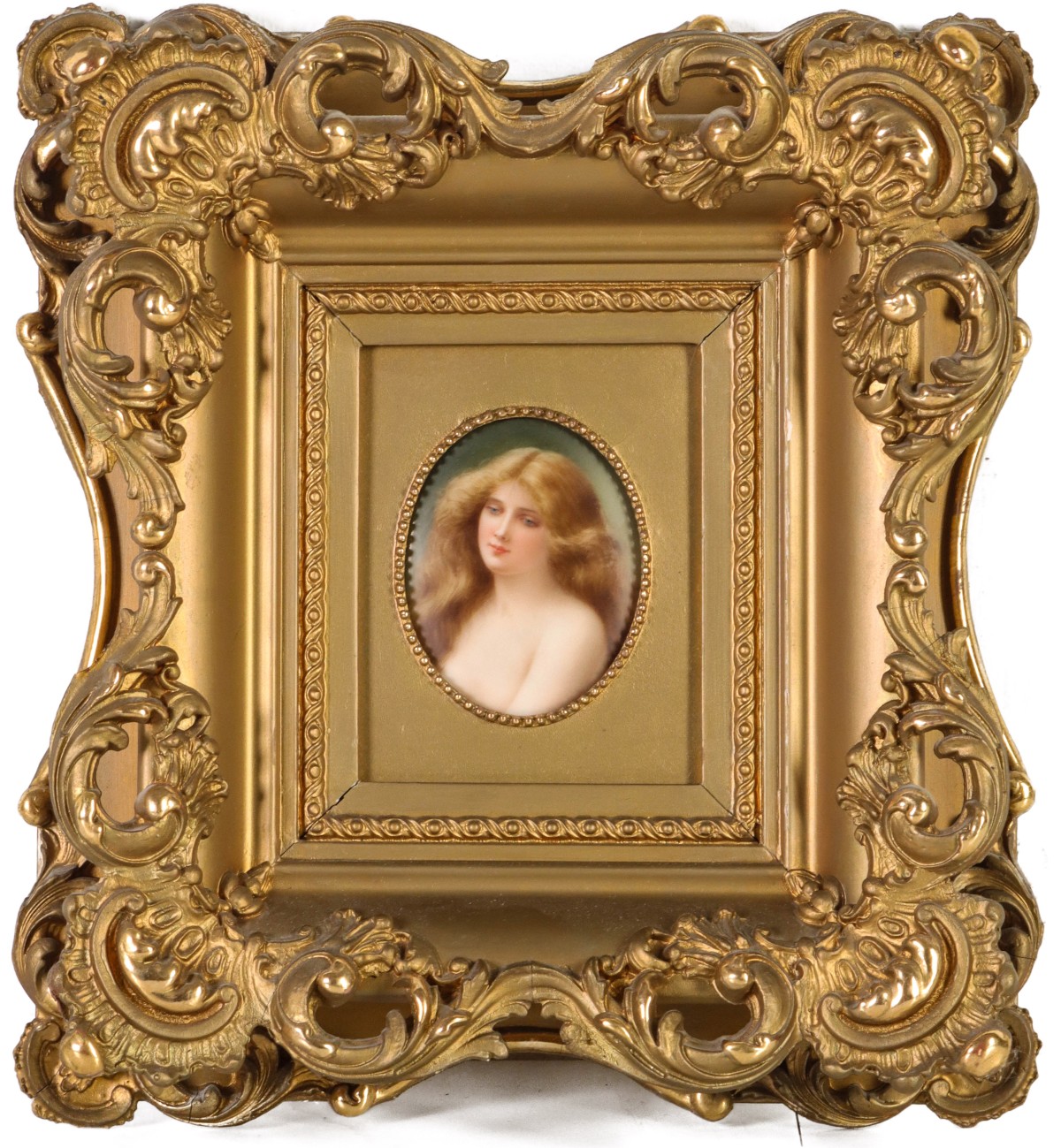 A 19TH CENTURY MINIATURE PORTRAIT ON PORCELAIN