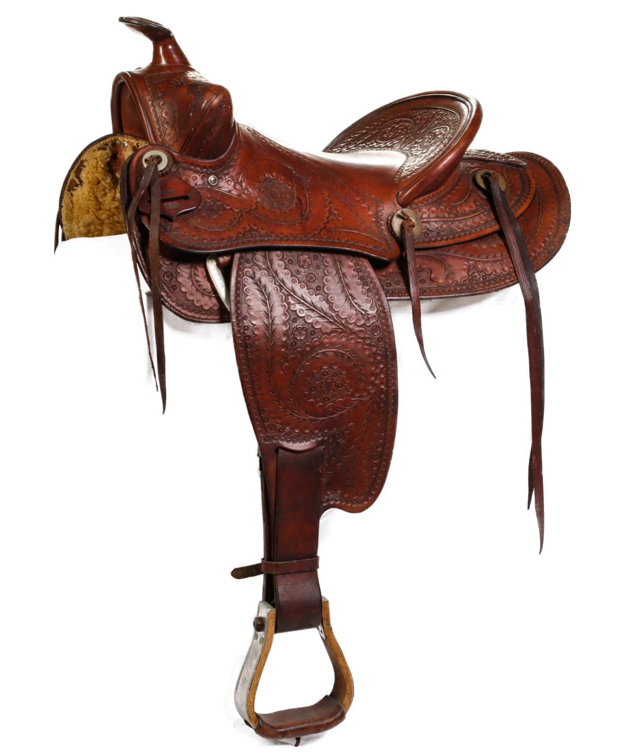 A VERY FINELY TOOLED WESTERN SADDLE SIGNED SHIPLEY