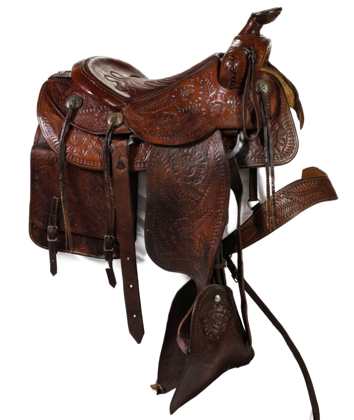 A TOOLED SADDLE WITH BAGS AND BREAST COLLAR BY MOSS KC