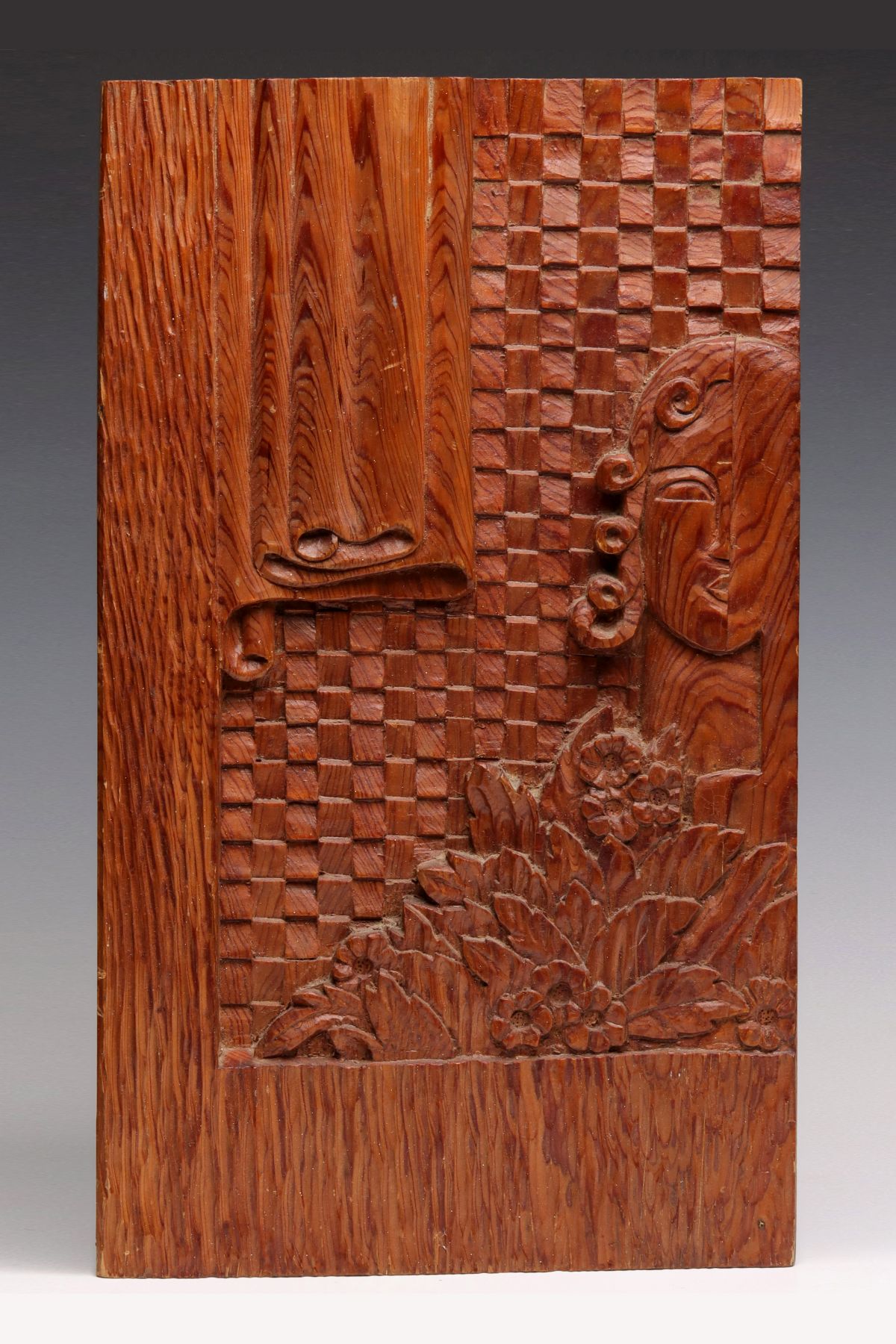 AN ART DECO INFLUENCE FOLK ART CARVED PANEL