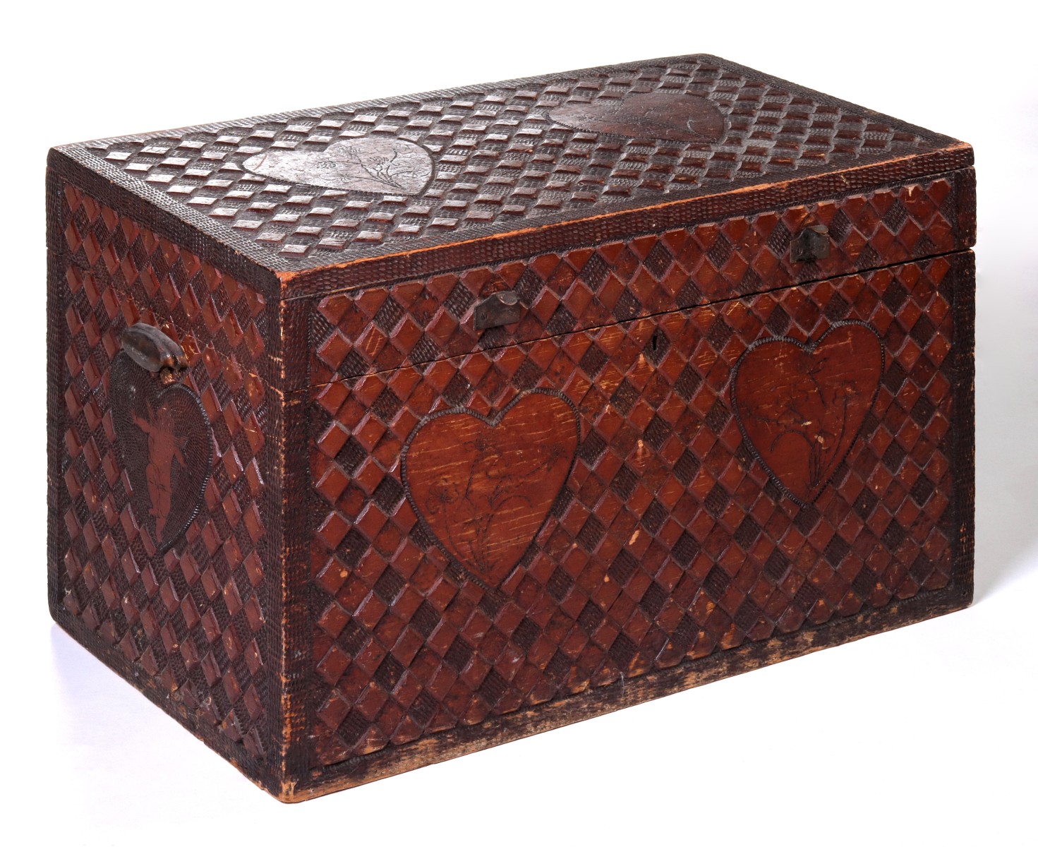 A 1900s CARVED FOLK ART WEDDING CHEST WITH HEARTS