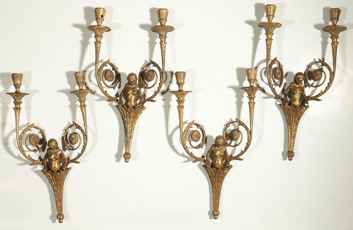 A SET OF FOUR 19 C. BRONZE DORE' CARYATID SCONCES