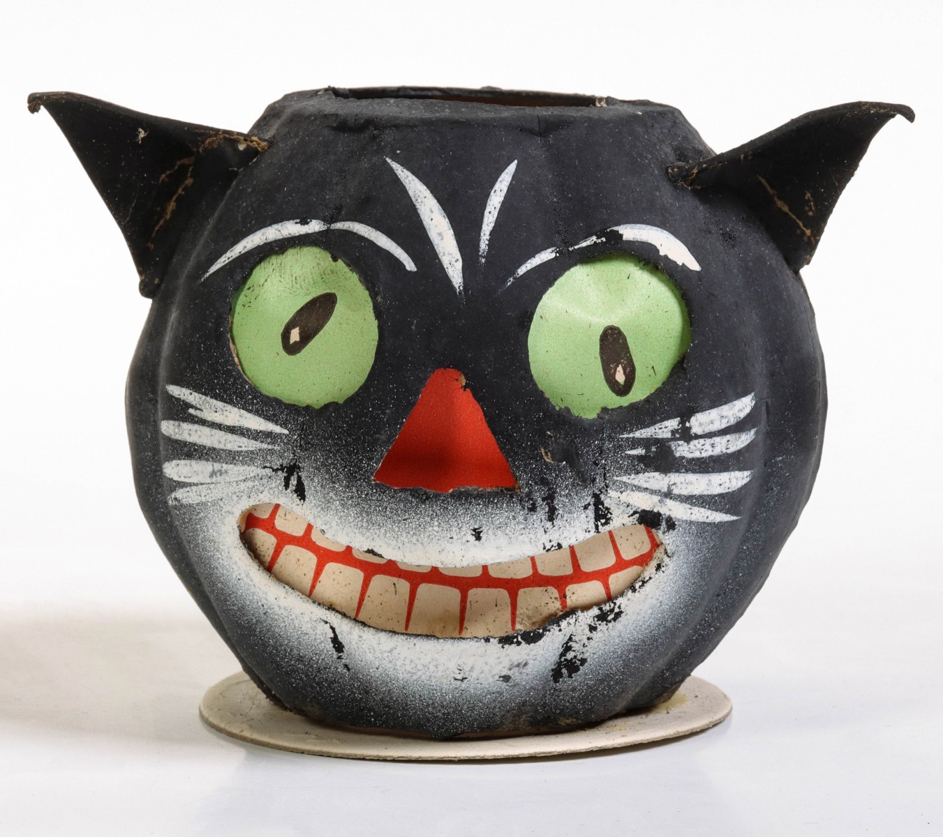 A PAPIER MACHE JACK-O-LANTERN CANDY CONTAINER