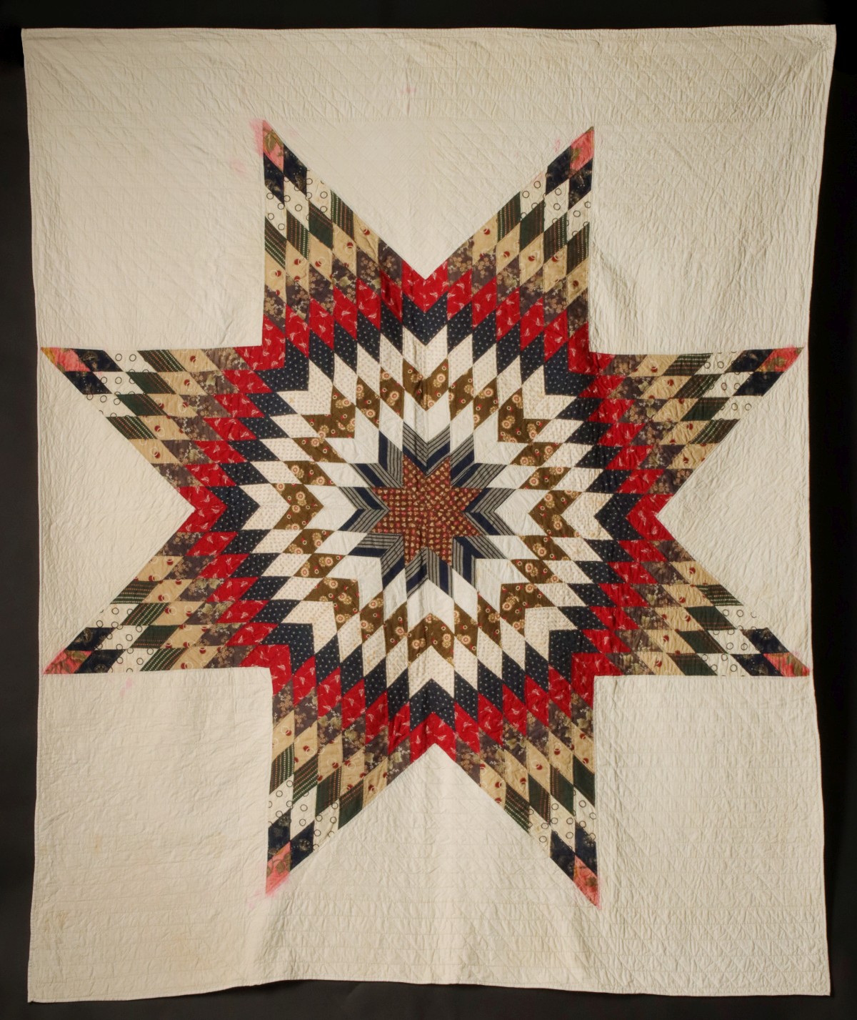 A STRIKING LONE STAR QUILT WITH EMBROIDERED DATE 1937