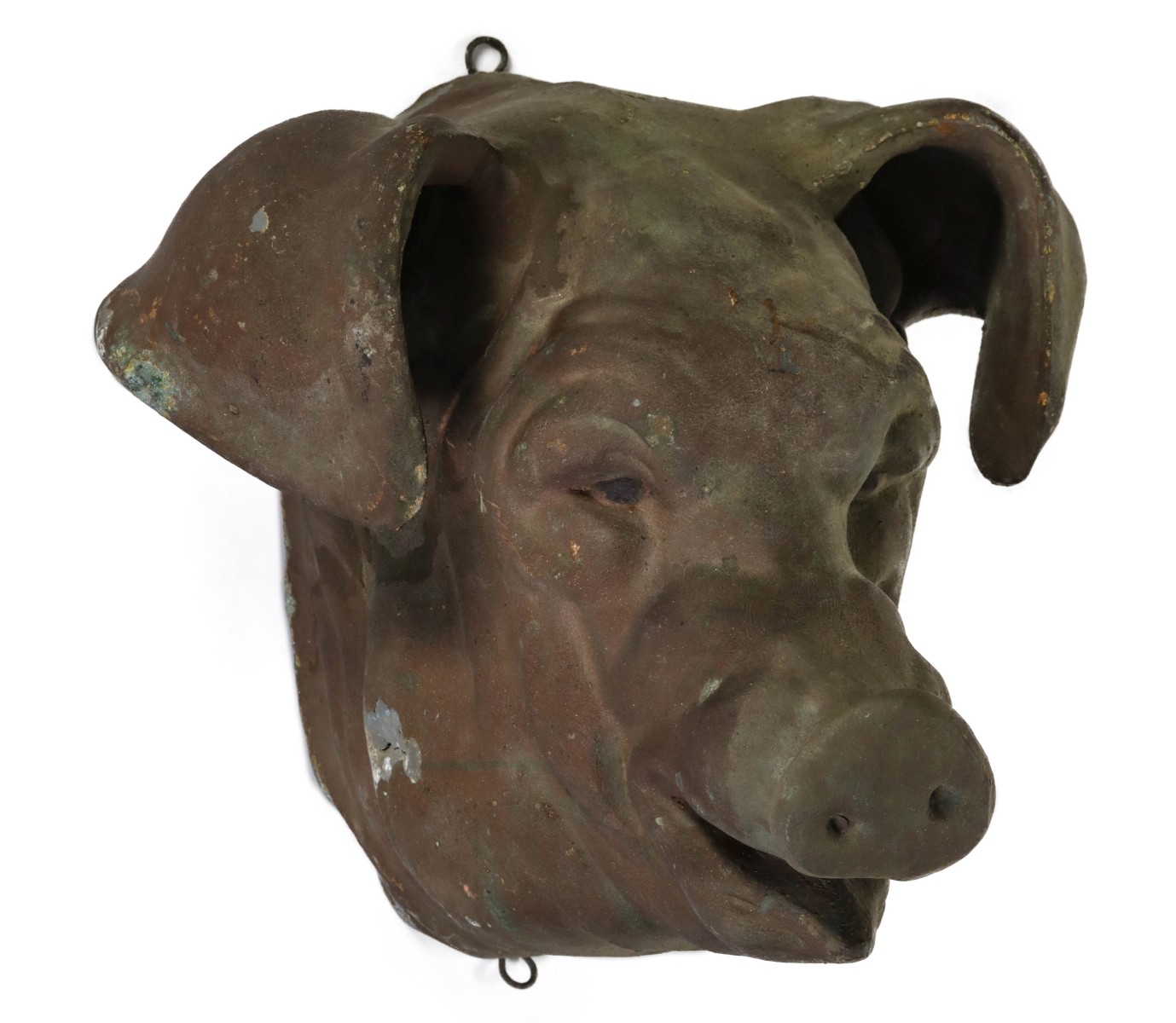 A 19TH CENTURY MOLDED ZINC PIG HEAD BUTCHER TRADE SIGN