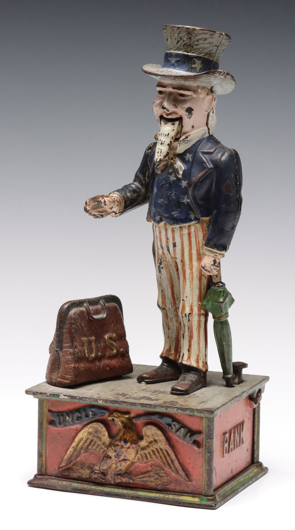 A SHEPHARD HARDWARE UNCLE SAM FIGURAL MECHANICAL BANK