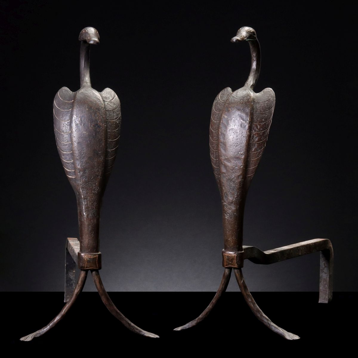 A PAIR OF FIGURAL WATERFOWL ANDIRONS SIGNED CAHILL