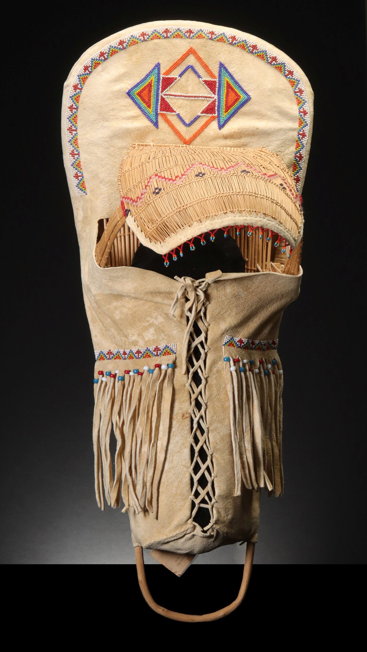 A PYRAMID LAKE PAIUTE INDIAN CRADLEBOARD WITH BEADING