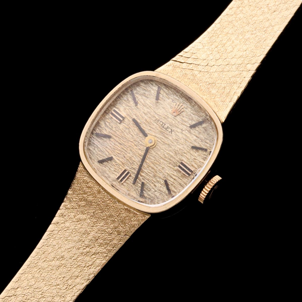 A LADIES 14K GOLD ROLEX WRIST WATCH WITH GOLD BAND