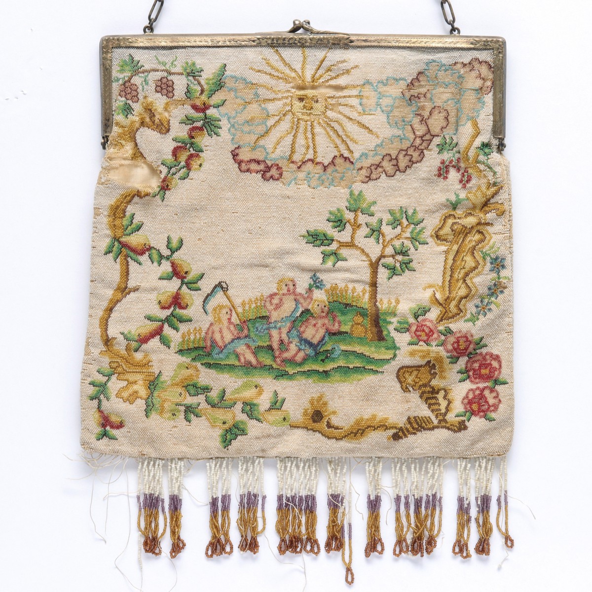 A CIRCA 1920 PICTORIAL BEADED PURSE WITH STERLING FRAME