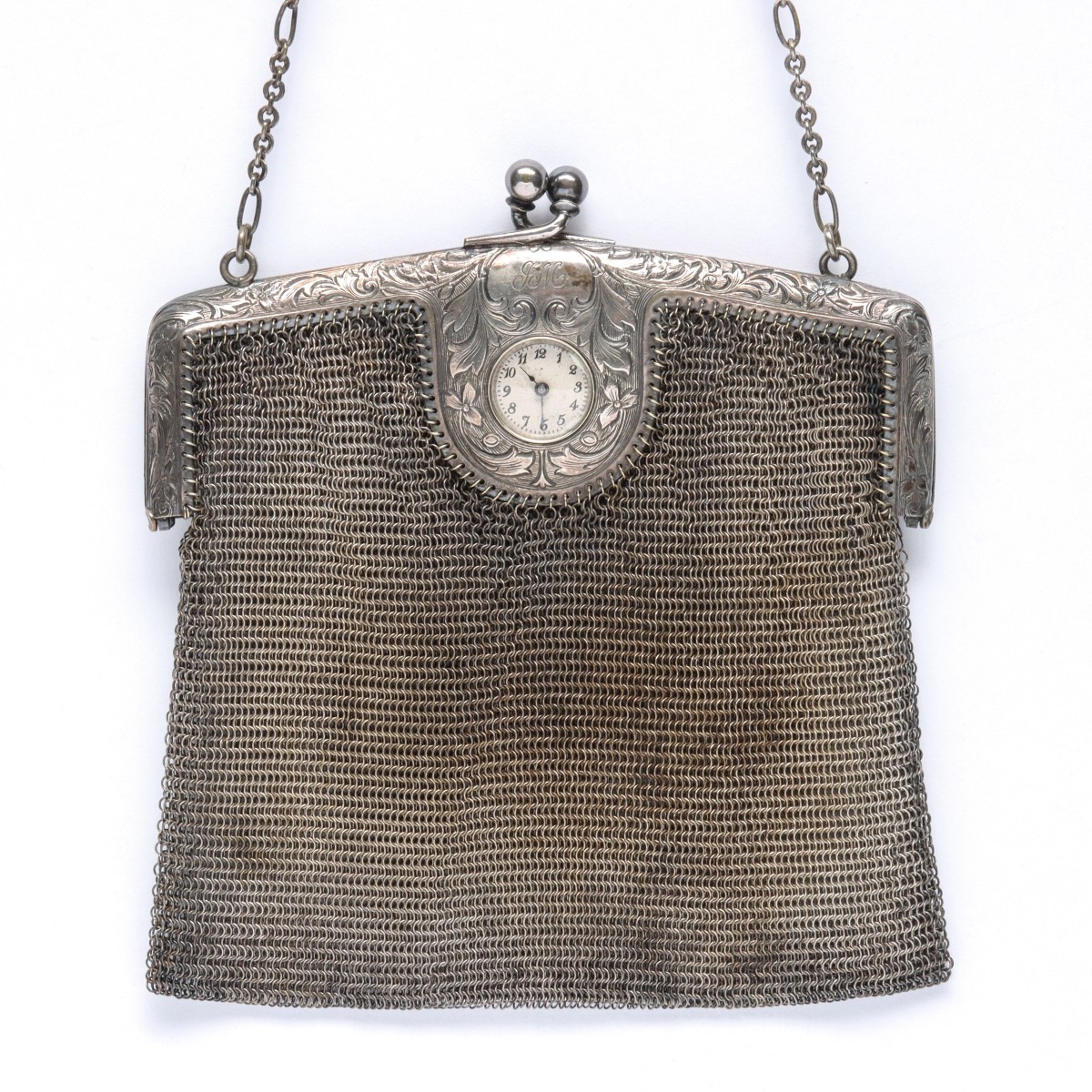 AN UNUSUAL 1920s SILVERED MESH EVENING BAG WITH WATCH