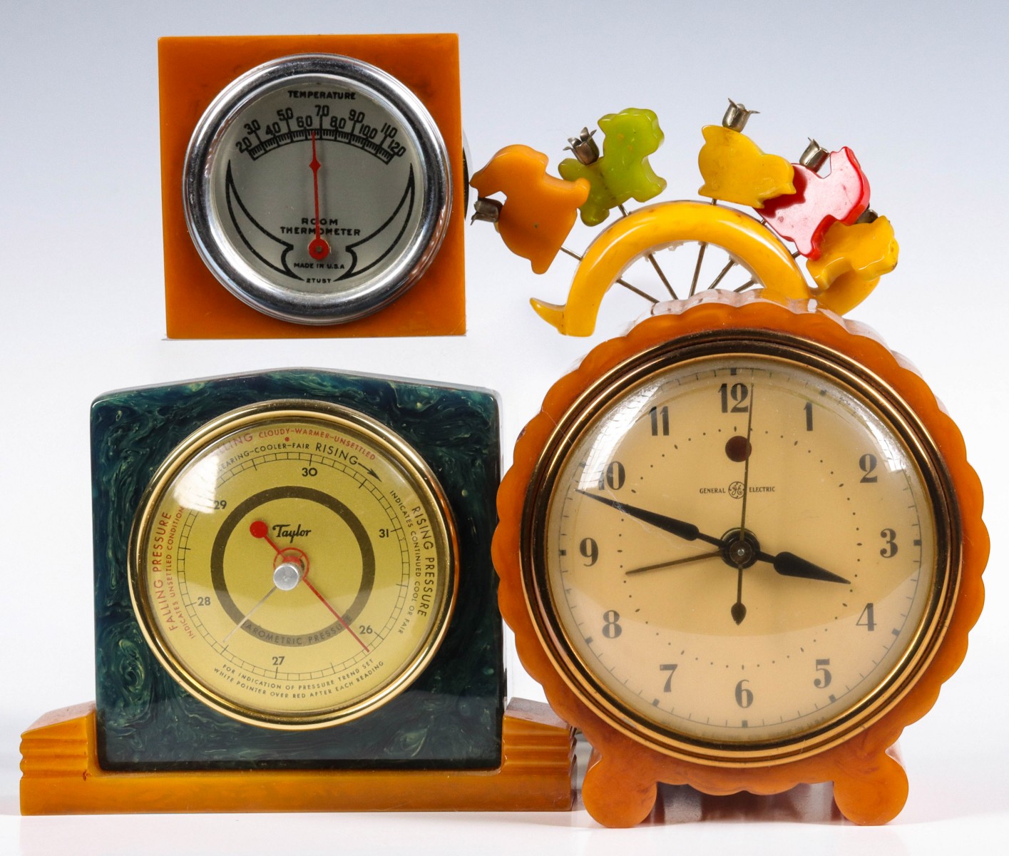 VINTAGE CATALIN COCKTAIL PICKS AND CLOCK CIRCA 1930s