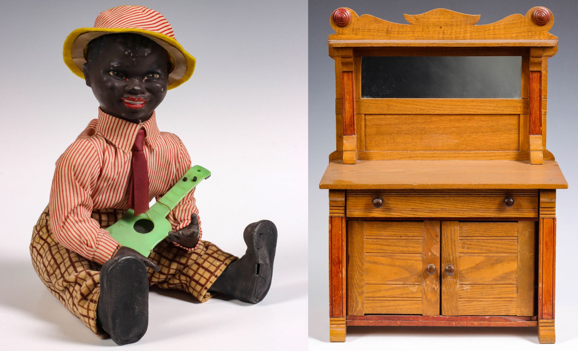 A VINTAGE MUSICAL BLACK RUBBER DOLL WITH DOLL FURNITURE