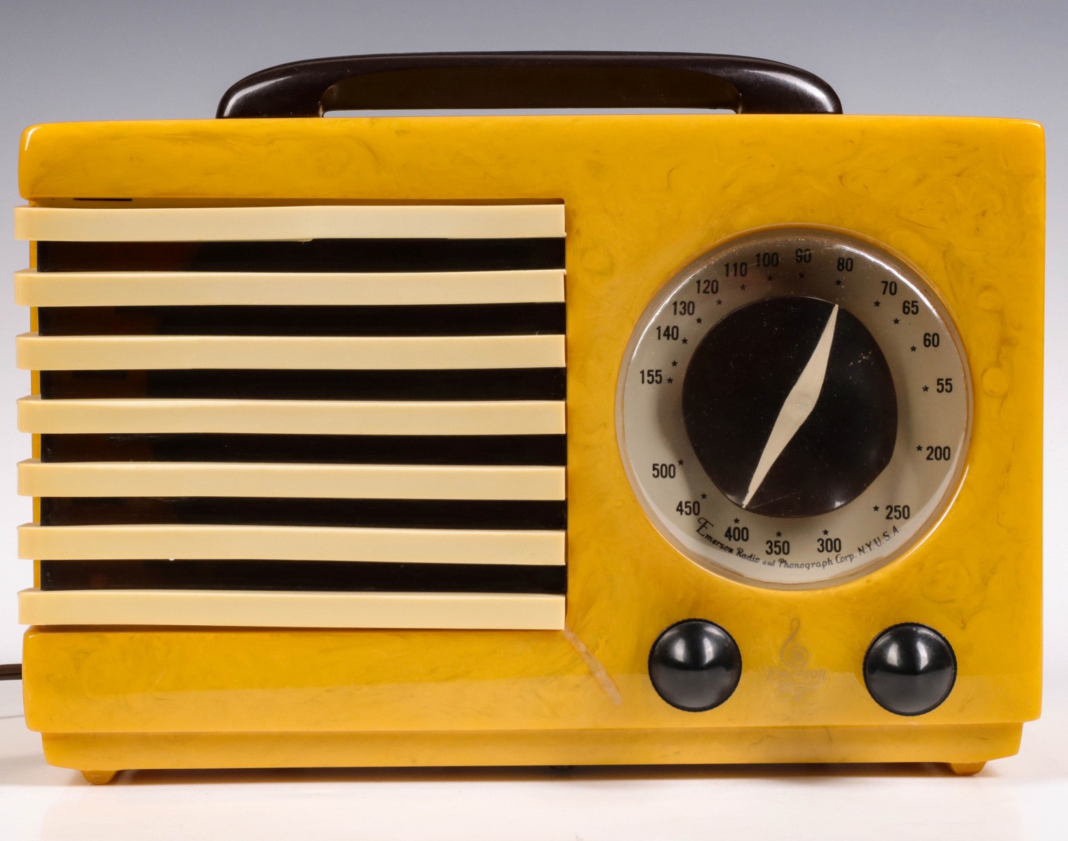 AN EMERSON CATALIN RADIO DESIGNED BY NORMAN BEL GEDDES