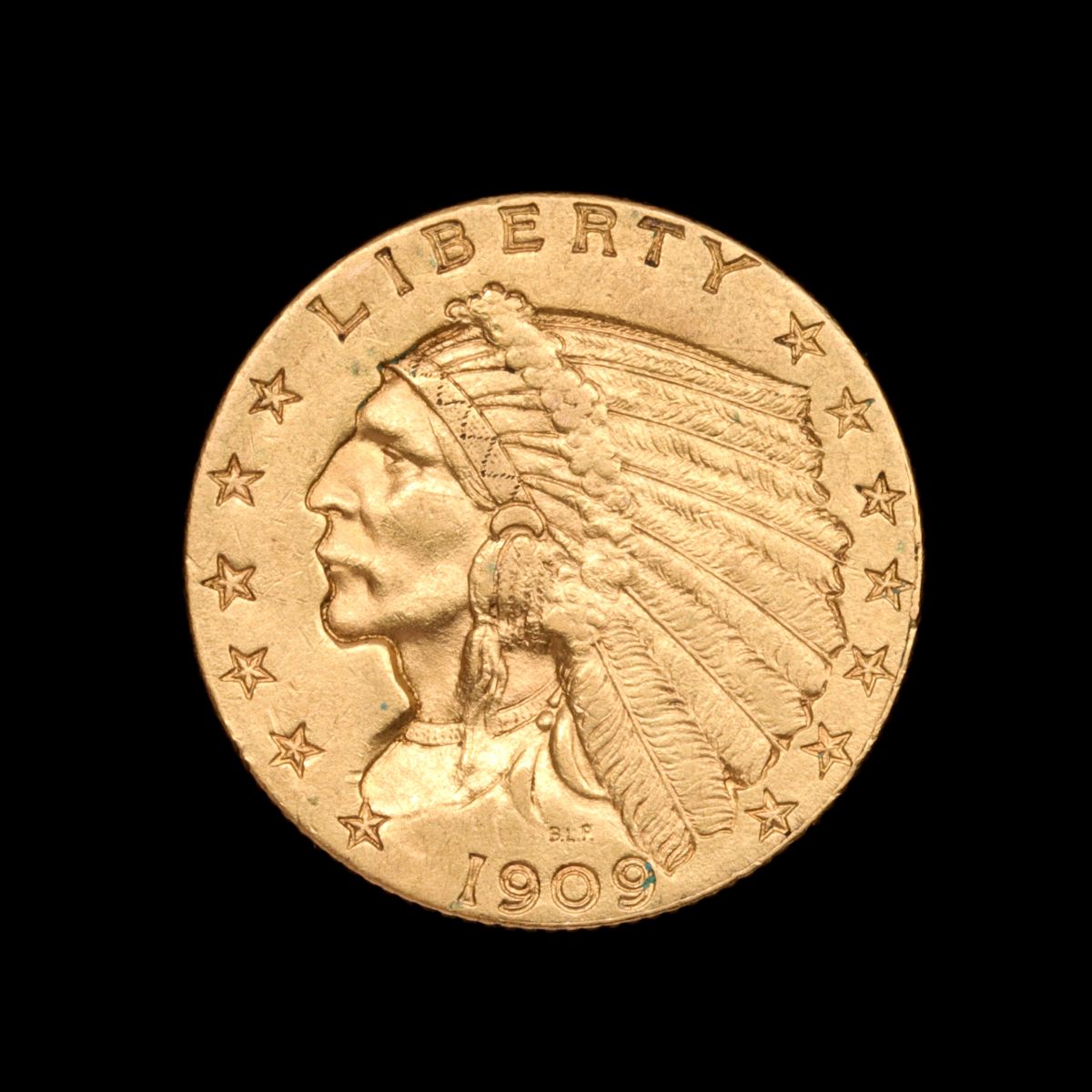 A 1909 $2.50 QUARTER EAGLE GOLD COIN