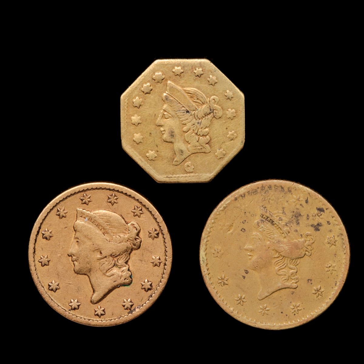 THREE SMALL DENOMINATION U.S. GOLD COINS