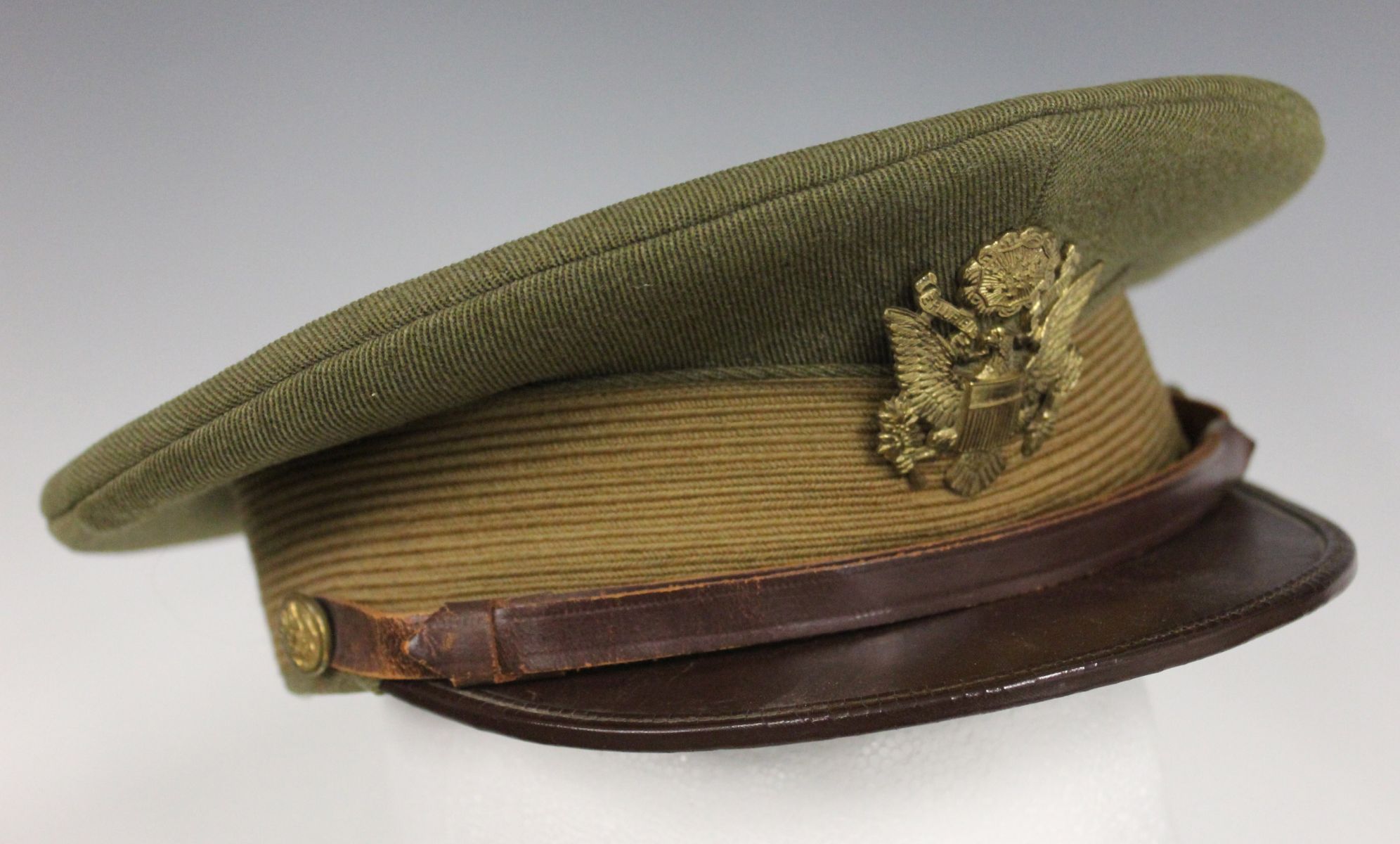 US ARMY WWI HELMET AND OFFICER VISOR CAP