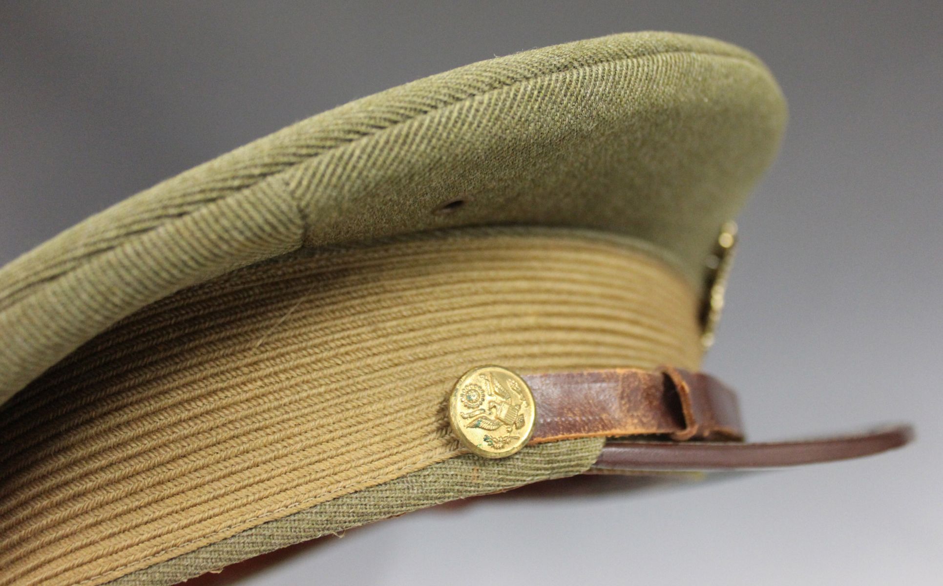 US ARMY WWI HELMET AND OFFICER VISOR CAP