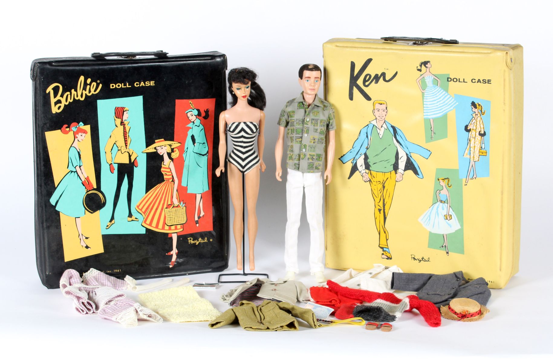 CIRCA 1960 BARBIE AND KEN DOLLS, CASES AND CLOTHING