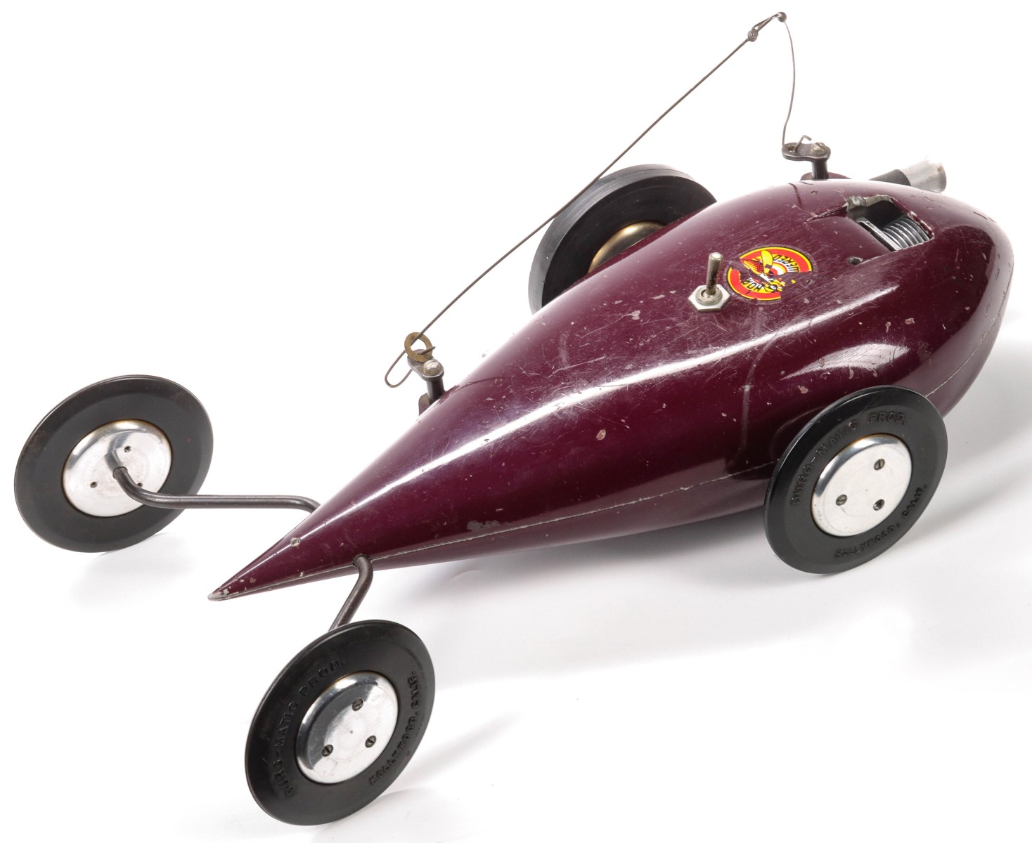 A CIRCA 1940s MCCOY TEARDROP TETHER CAR W/ HORNET MOTOR