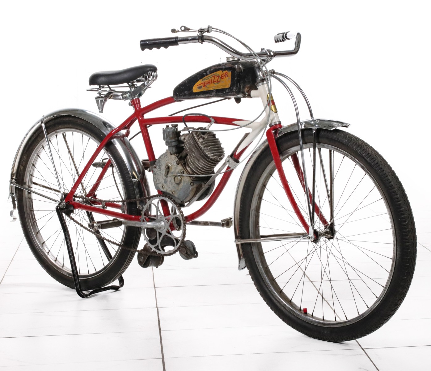 AN EARLY WHIZZER MODEL D MOTOR ON LATER SCHWINN BIKE