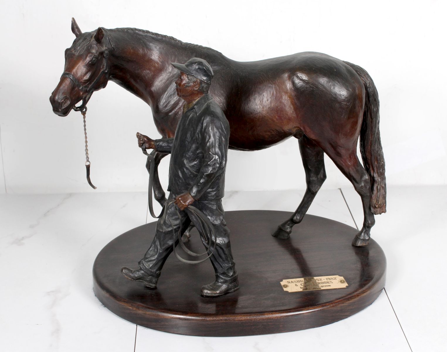 BRONZE SCULPTURE OF THE RACEHORSE NASHUA AND CLEM BROOKS