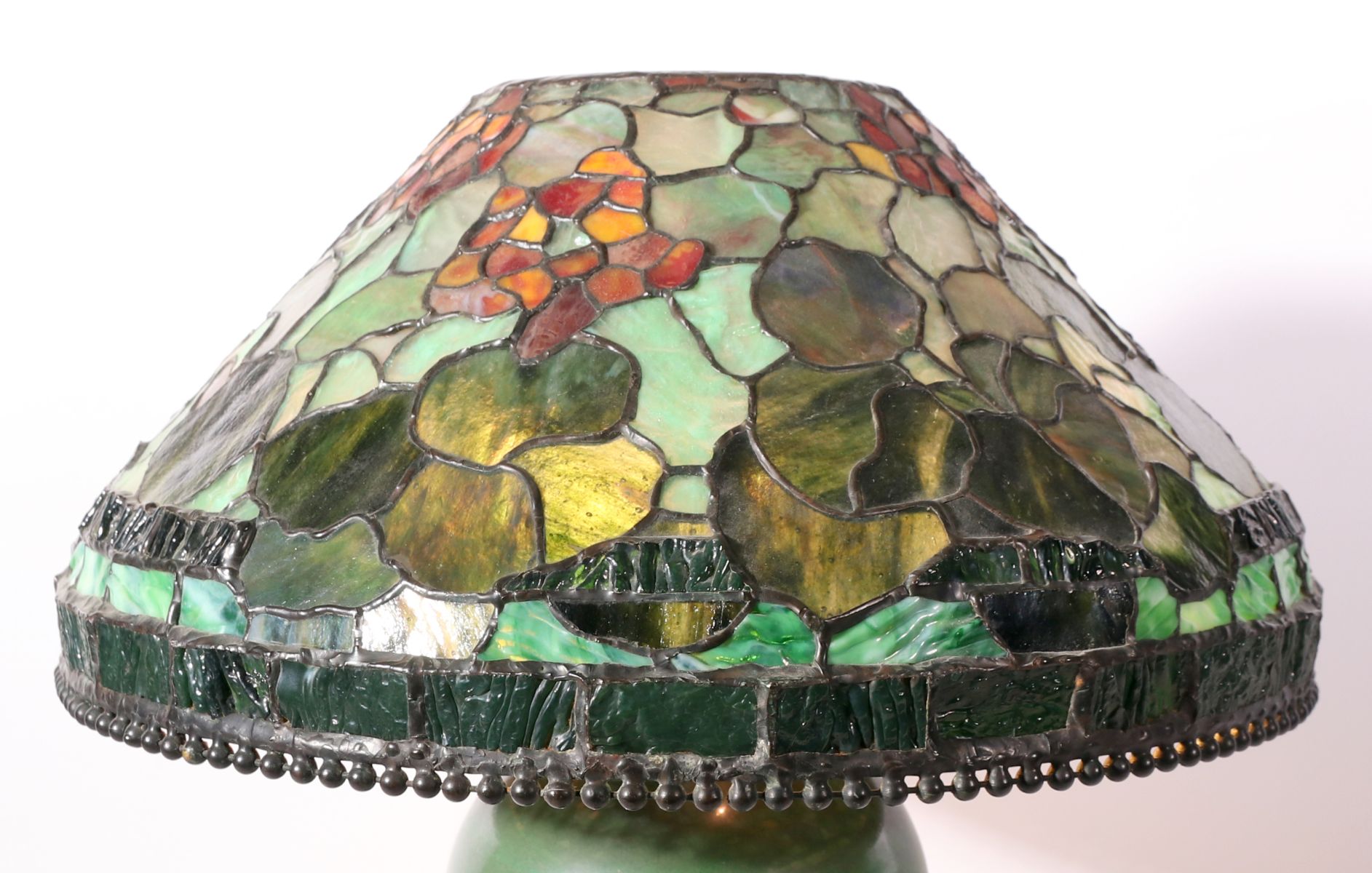 A CONTEMPORARY HAND MADE STAINED AND LEADED GLASS SHADE