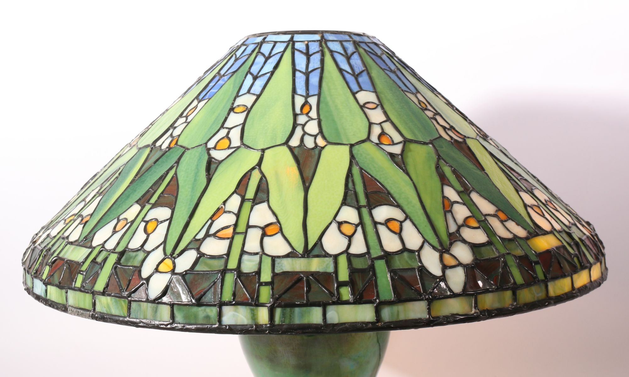 A CONTEMPORARY HAND MADE STAINED AND LEADED GLASS SHADE