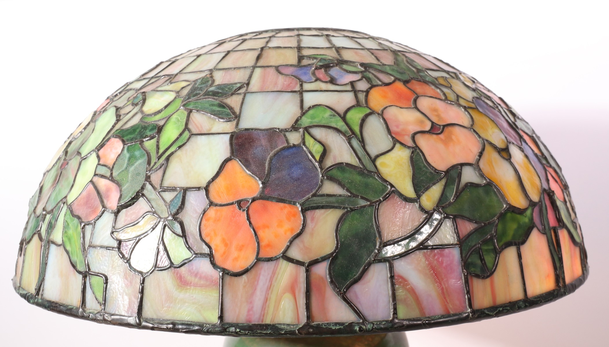 A CONTEMPORARY 24-INCH FLORAL PATTERN LEADED SHADE