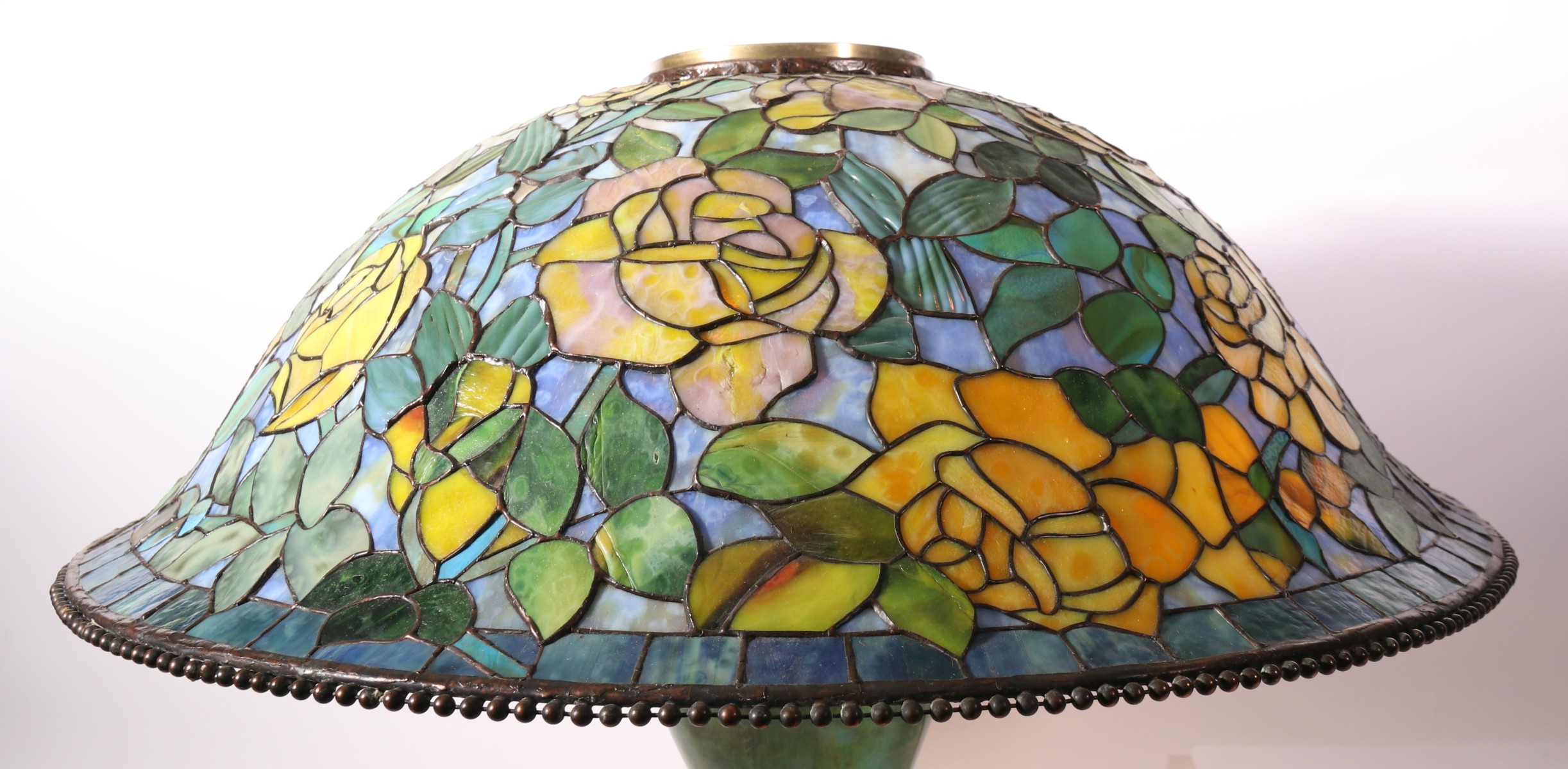 A CONTEMPORARY 25-INCH FLORAL PATTERN LEADED SHADE