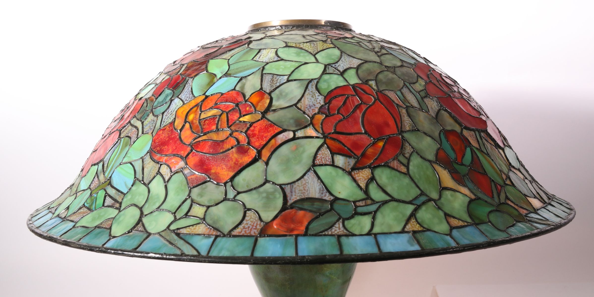 A CONTEMPORARY 24-INCH FLORAL PATTERN LEADED SHADE