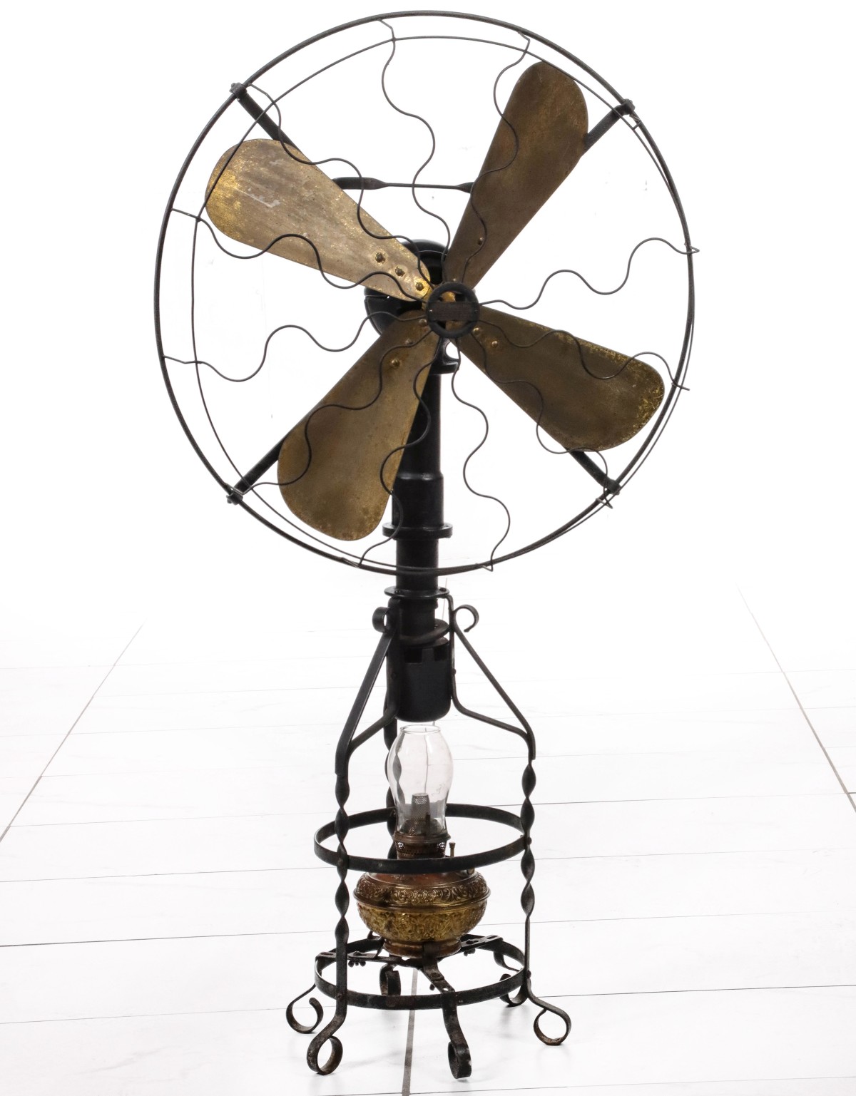 A RARE J.H. STRONG 'LAKE BREEZE' HEAT POWERED FLOOR FAN