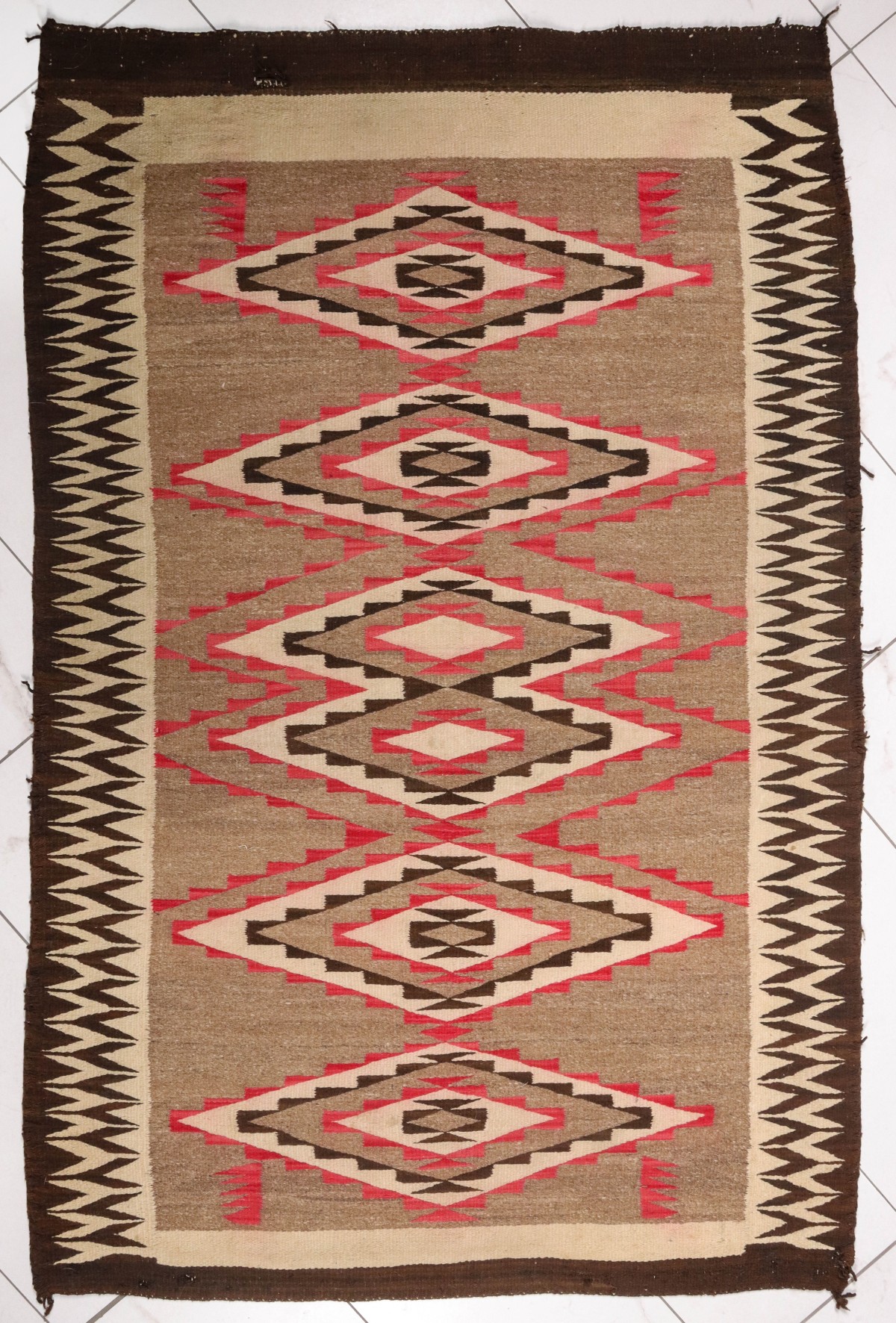 A CIRCA 1940s NAVAJO GANADO RUG