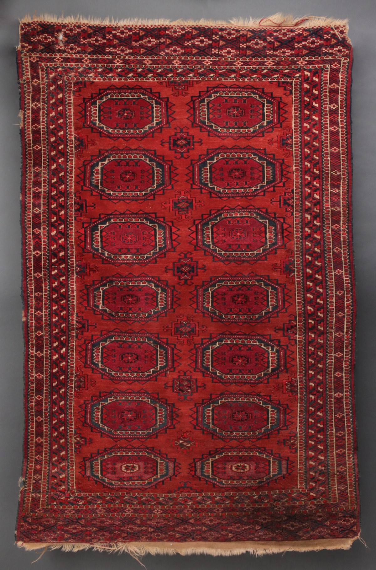 A WEST TURKESTAN TEKKE SCATTER RUG CIRCA 1920