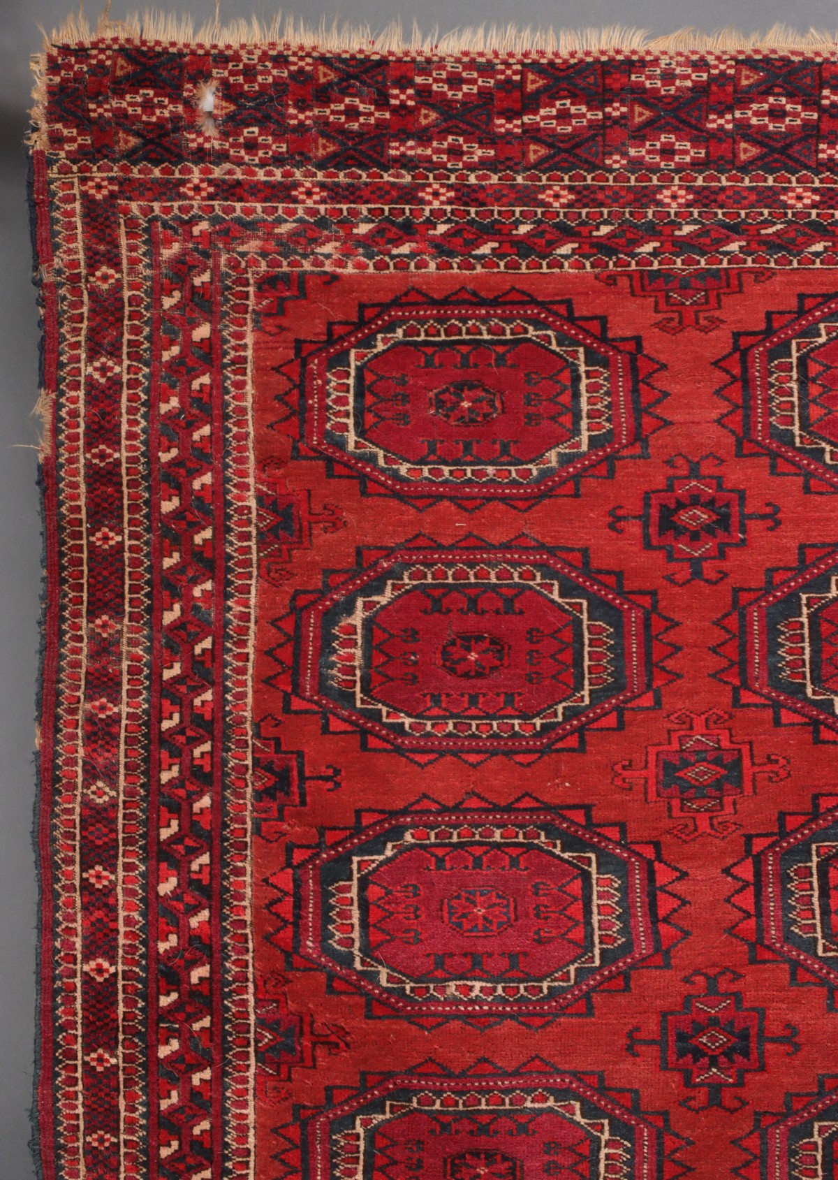 A WEST TURKESTAN TEKKE SCATTER RUG CIRCA 1920