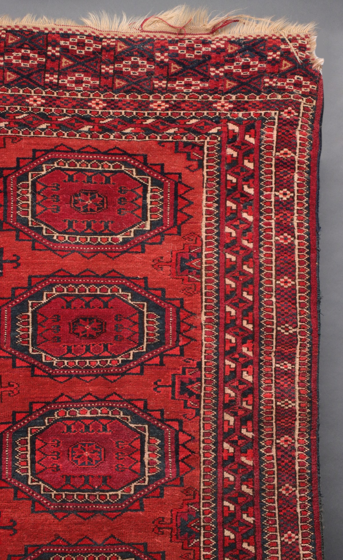 A WEST TURKESTAN TEKKE SCATTER RUG CIRCA 1920