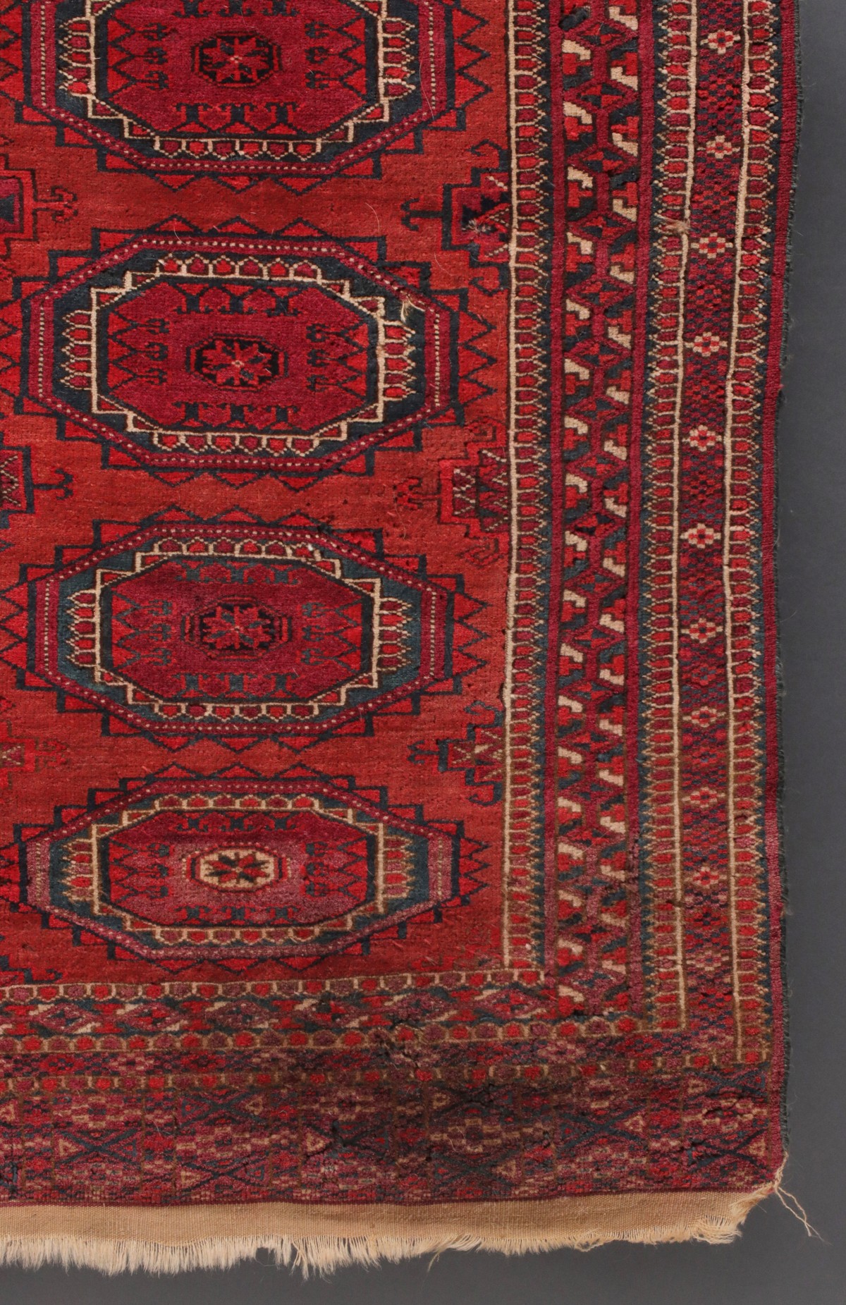 A WEST TURKESTAN TEKKE SCATTER RUG CIRCA 1920