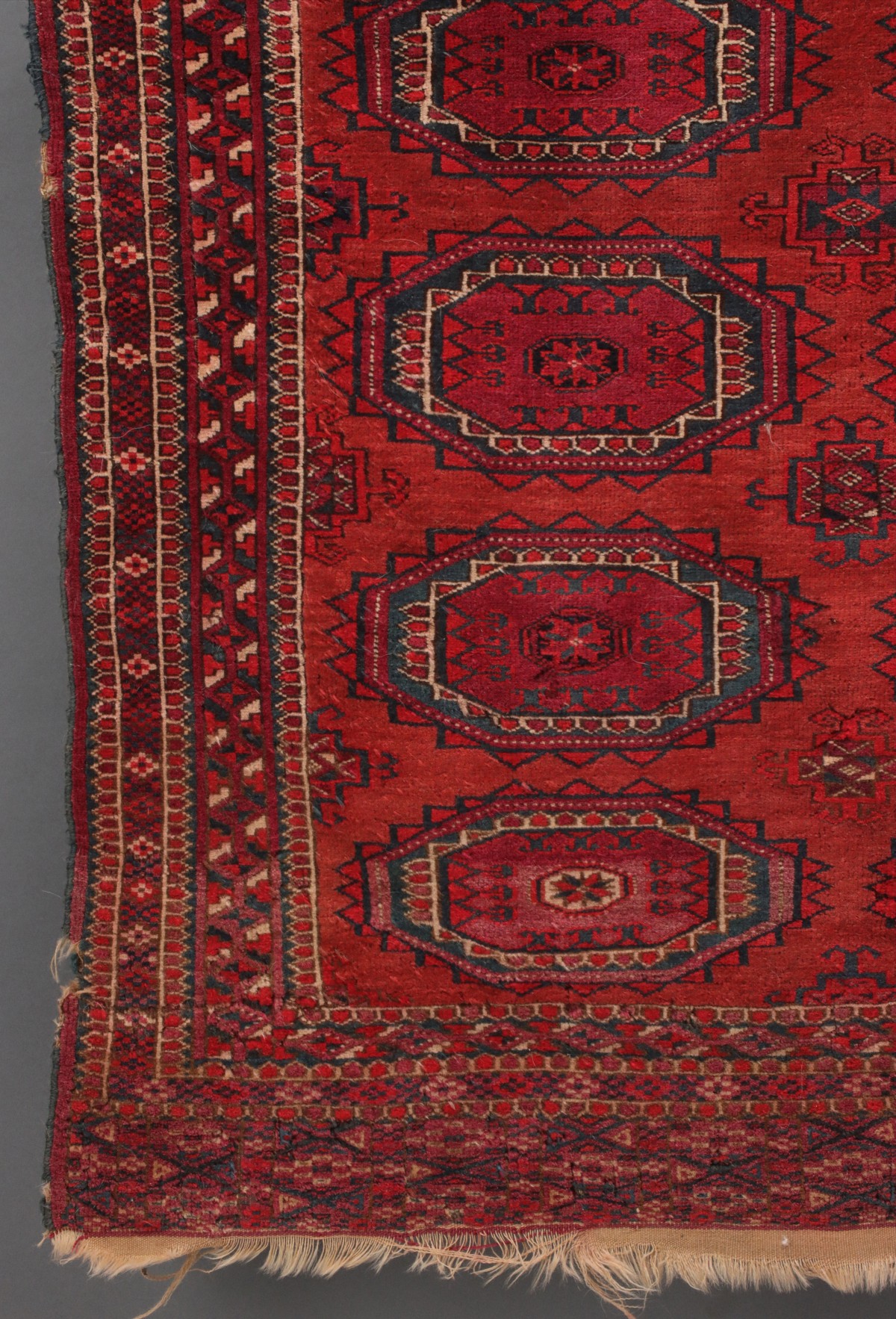 A WEST TURKESTAN TEKKE SCATTER RUG CIRCA 1920