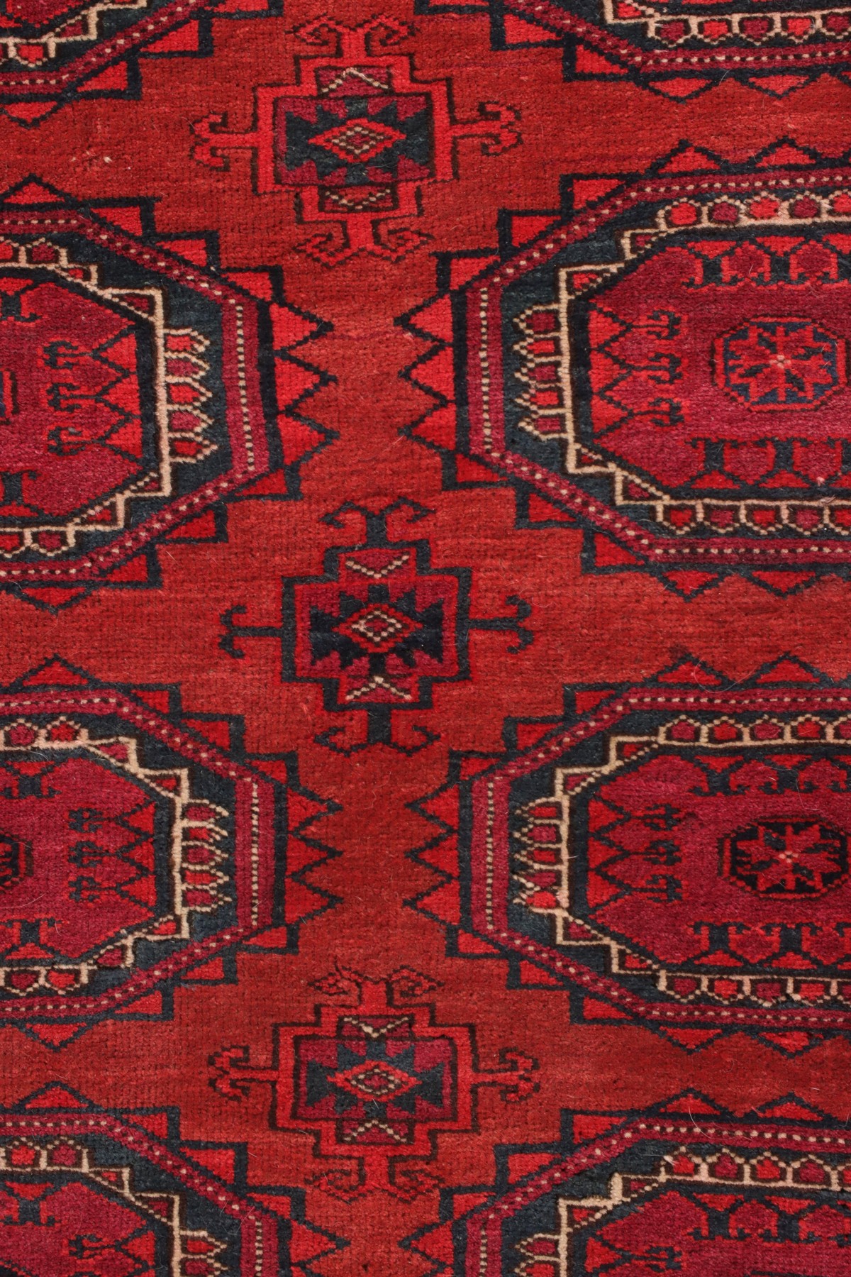 A WEST TURKESTAN TEKKE SCATTER RUG CIRCA 1920