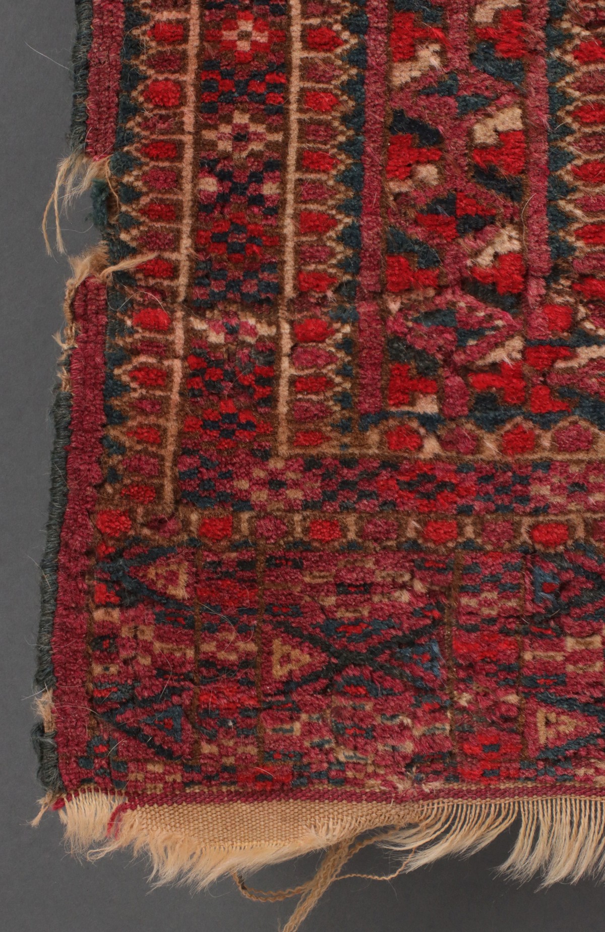 A WEST TURKESTAN TEKKE SCATTER RUG CIRCA 1920