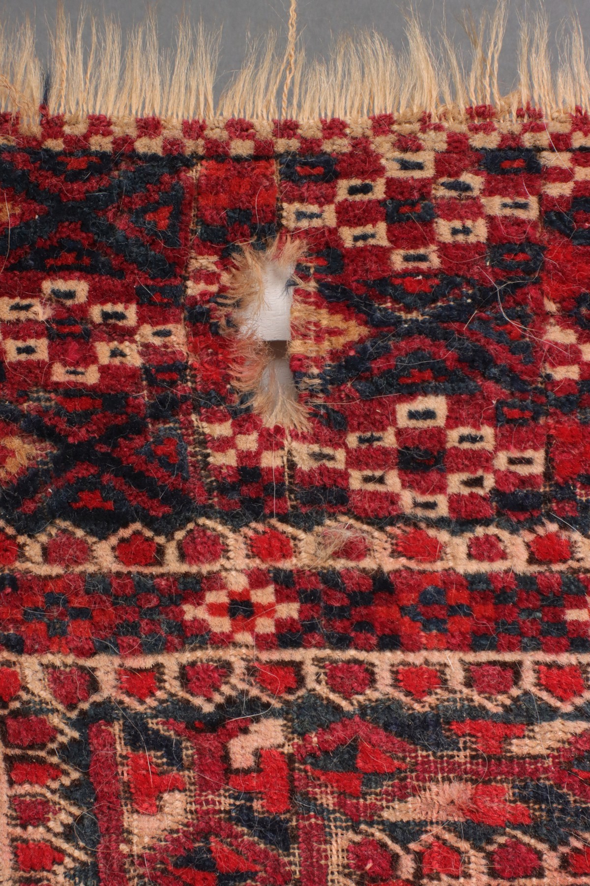 A WEST TURKESTAN TEKKE SCATTER RUG CIRCA 1920