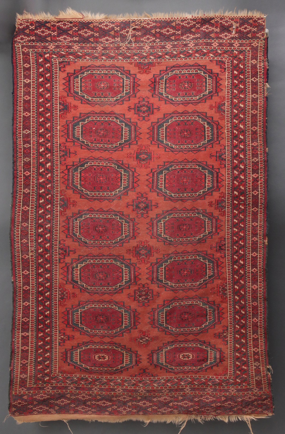 A WEST TURKESTAN TEKKE SCATTER RUG CIRCA 1920