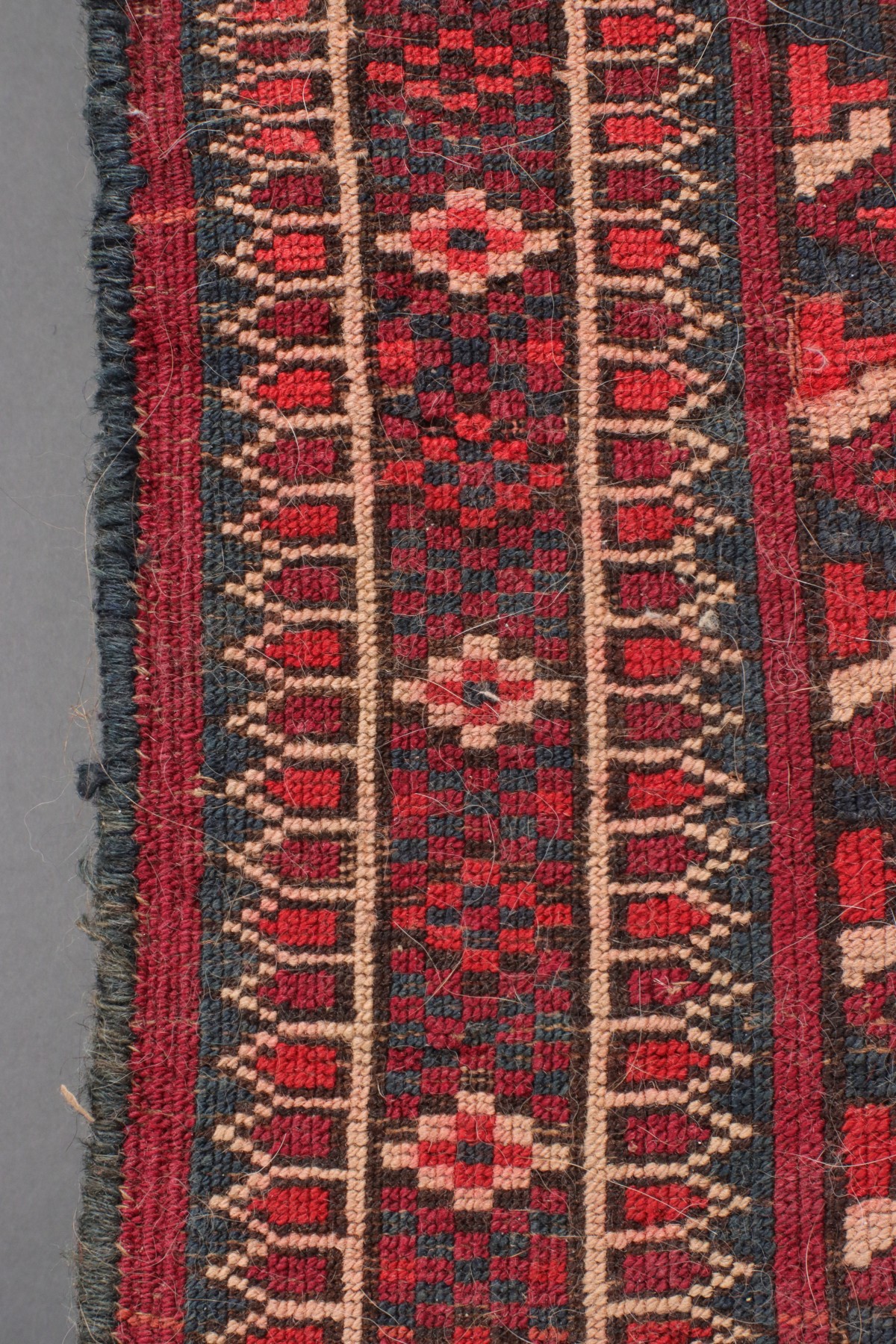 A WEST TURKESTAN TEKKE SCATTER RUG CIRCA 1920