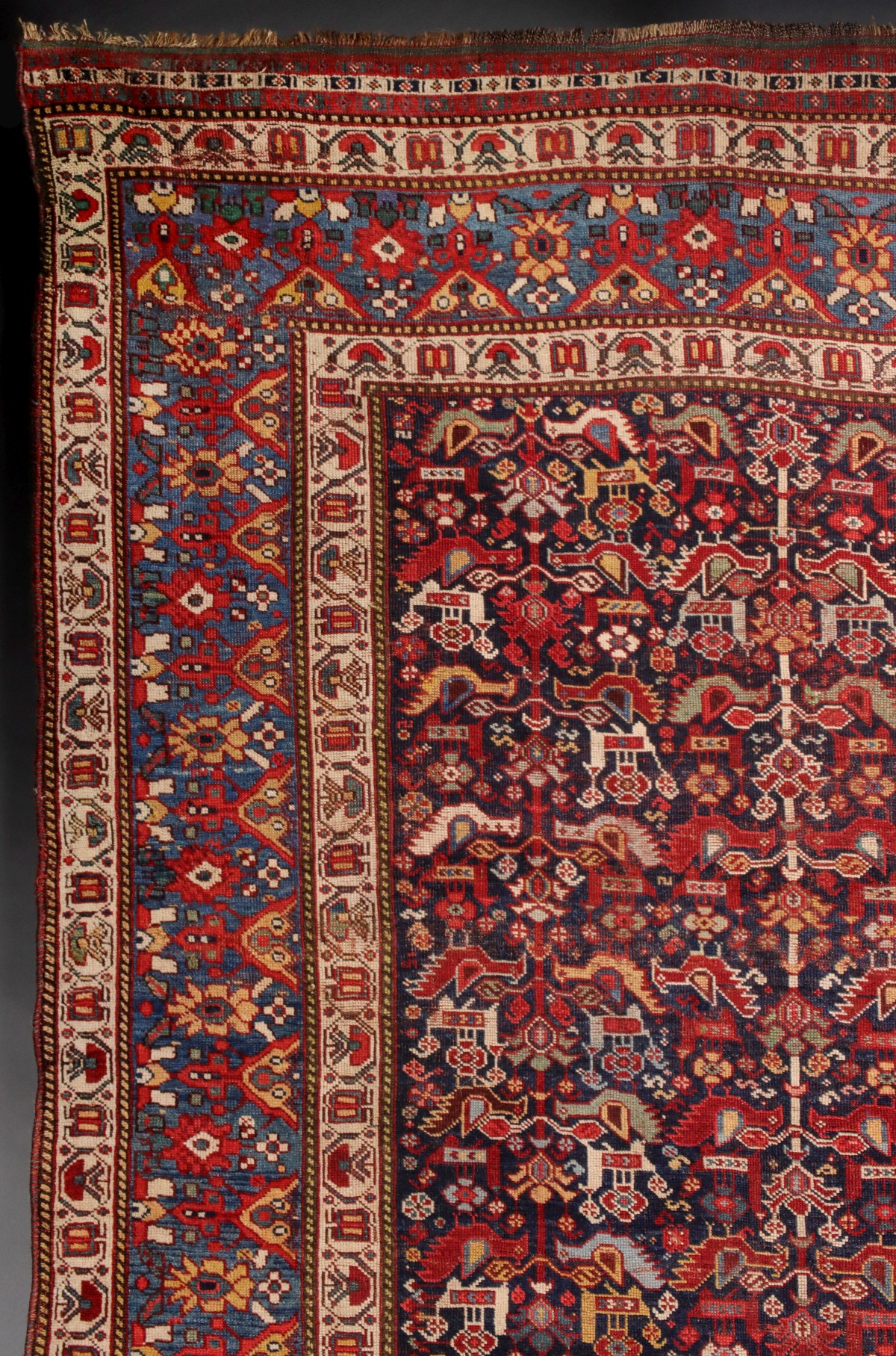 A SOUTHWEST PERSIAN KAMSEH AREA RUG CIRCA 1900