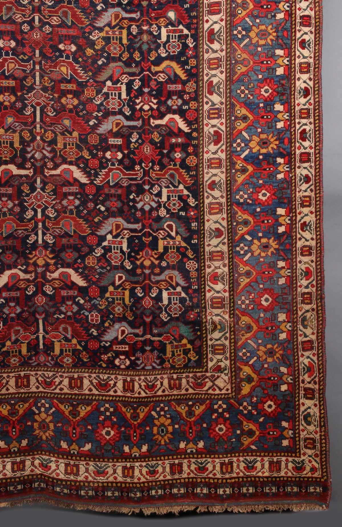 A SOUTHWEST PERSIAN KAMSEH AREA RUG CIRCA 1900