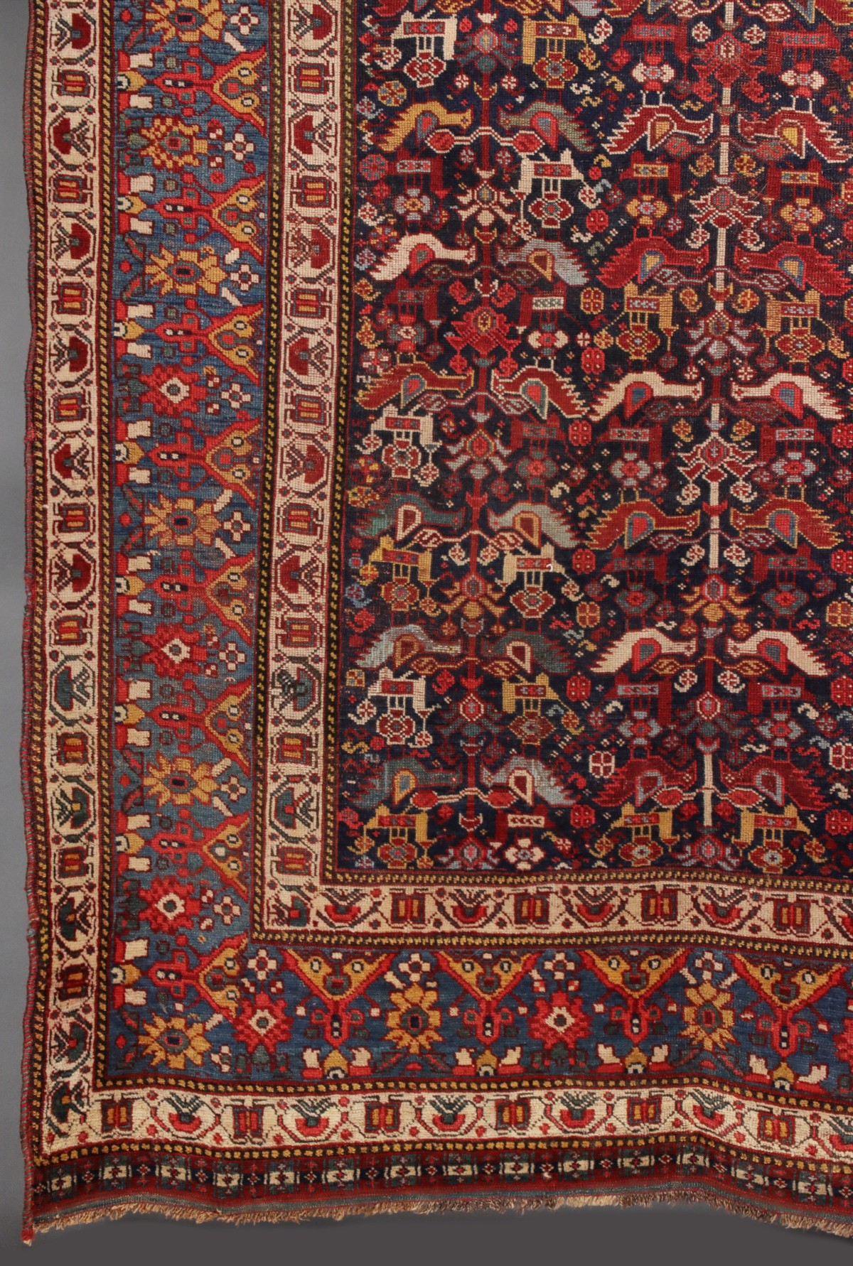 A SOUTHWEST PERSIAN KAMSEH AREA RUG CIRCA 1900